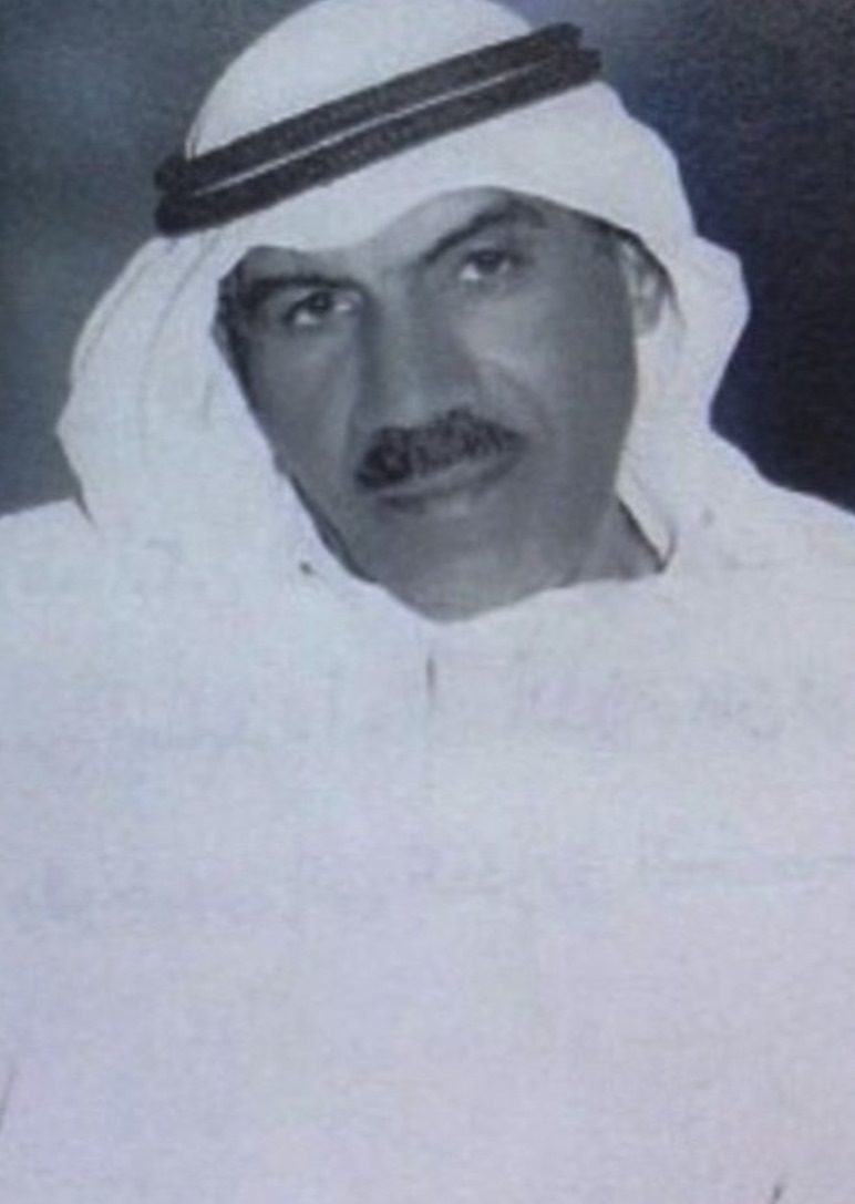 Archival photograph of Obaid Al Taboor mentoring students